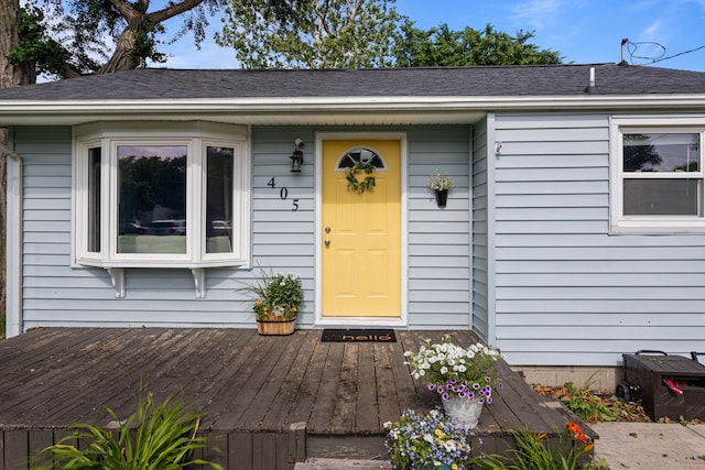 405 N Vorcey St, Tolono, IL 61880 - entrance to property featuring a wooden deck