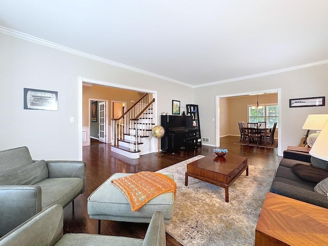 566 Primrose Ln, Crystal Lake, IL 60014 - living area featuring wood finished floors, stairs, and ornamental molding