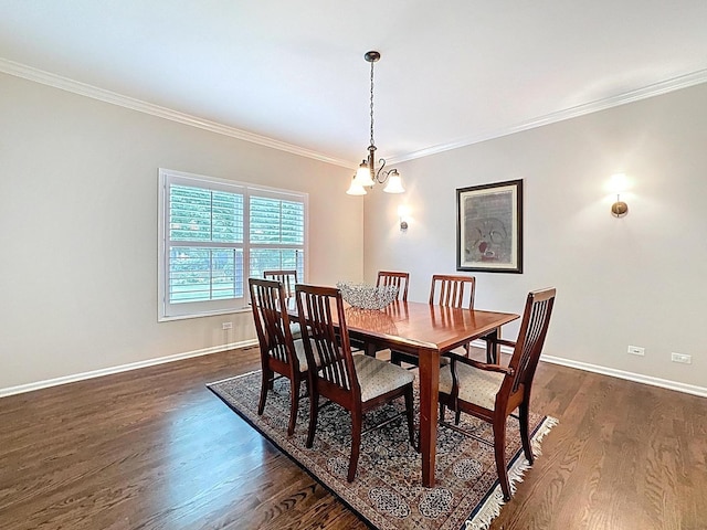 566 Primrose Ln, Crystal Lake, IL 60014 - dining area featuring dark wood-style flooring, crown molding, and a chandelier