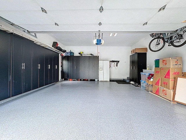 566 Primrose Ln, Crystal Lake, IL 60014 - garage featuring a garage door opener