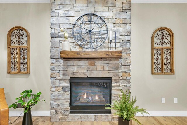 1603 English Oak Dr, Champaign, IL 61822 - detailed view of wood finished floors and a fireplace