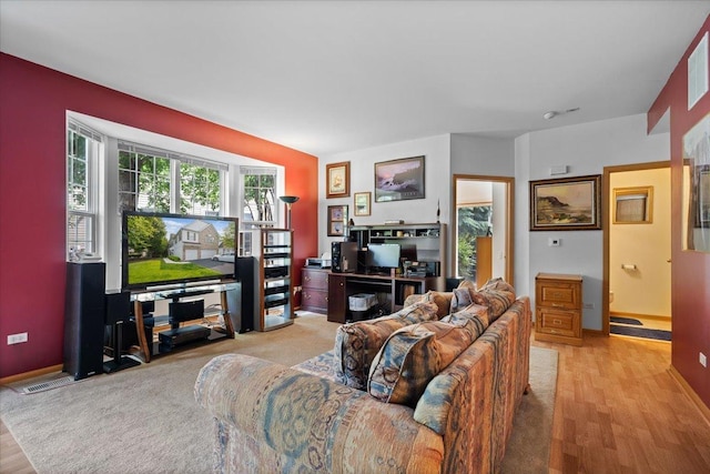 2936 Stonewater Dr Unit 2936, Naperville, IL 60564 - living room featuring wood finished floors and baseboards