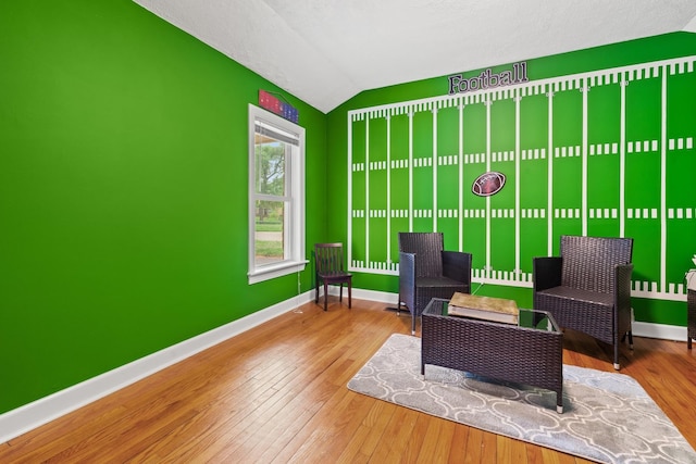 2250 Corona Rd, Waukegan, IL 60087 - sitting room with lofted ceiling and hardwood / wood-style floors