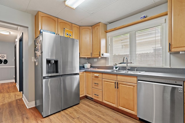 2250 Corona Rd, Waukegan, IL 60087 - kitchen with stainless steel appliances, light wood-style floors, and light brown cabinetry