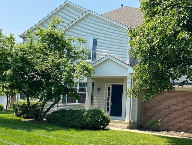 1830 Maureen Dr, Hoffman Estates, IL 60192 - view of front of property featuring a front yard and entry steps