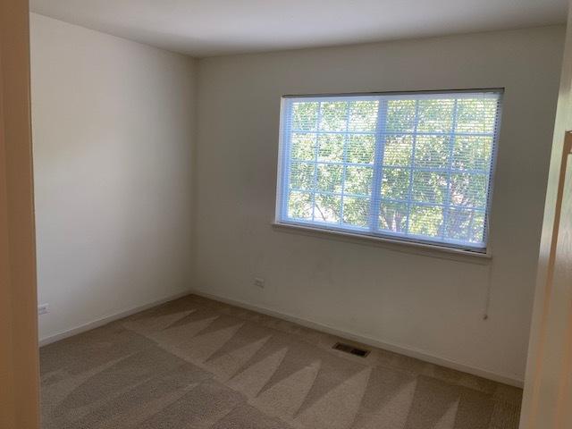 1830 Maureen Dr, Hoffman Estates, IL 60192 - unfurnished room with carpet and baseboards