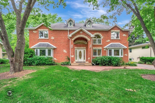 352 Rye Rd, Mundelein, IL 60060 - view of front of property featuring brick siding and a front yard