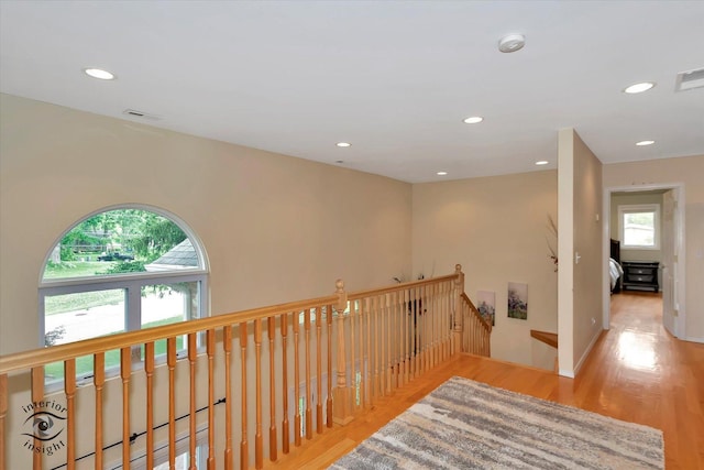 352 Rye Rd, Mundelein, IL 60060 - hall featuring healthy amount of natural light, an upstairs landing, wood finished floors, and recessed lighting