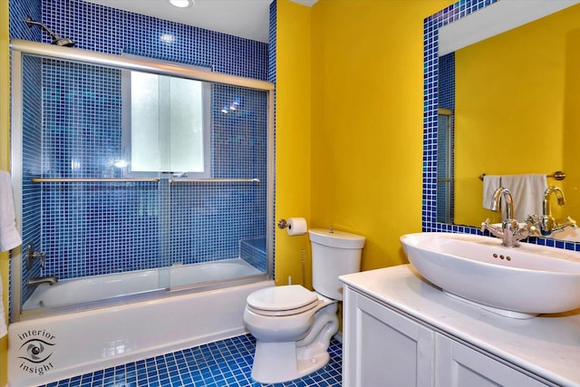 352 Rye Rd, Mundelein, IL 60060 - bathroom with vanity, tile patterned floors, and bath / shower combo with glass door