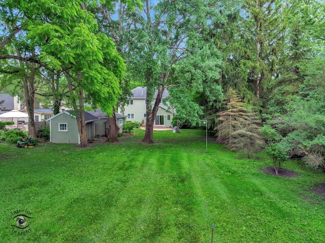 352 Rye Rd, Mundelein, IL 60060 - view of green lawn with an outbuilding