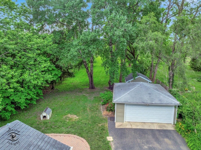 352 Rye Rd, Mundelein, IL 60060 - view of grassy yard featuring a detached garage