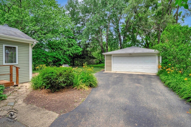 352 Rye Rd, Mundelein, IL 60060 - detached garage featuring view of scattered trees