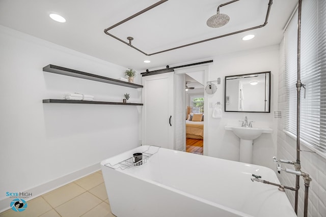 1659 N Francisco Ave, Chicago, IL 60647 - full bath with a freestanding tub, recessed lighting, tile patterned floors, and connected bathroom