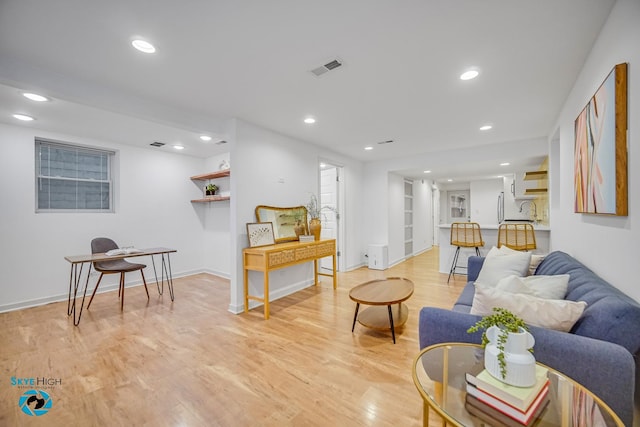 1659 N Francisco Ave, Chicago, IL 60647 - living room with light wood-type flooring, recessed lighting, and built in features