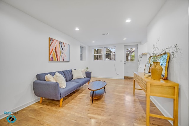 1659 N Francisco Ave, Chicago, IL 60647 - living area with light wood-type flooring and recessed lighting