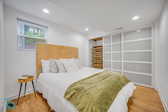 1659 N Francisco Ave, Chicago, IL 60647 - bedroom featuring wood finished floors and recessed lighting