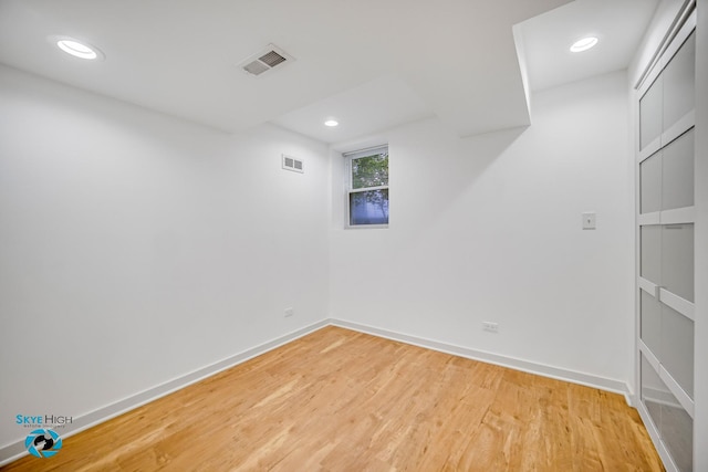1659 N Francisco Ave, Chicago, IL 60647 - spare room with light wood-style flooring and recessed lighting