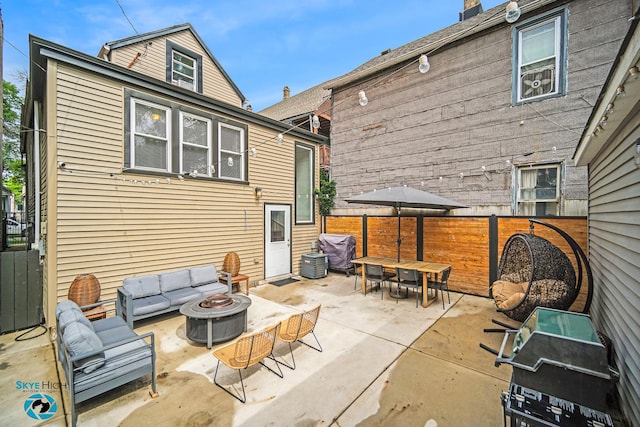 1659 N Francisco Ave, Chicago, IL 60647 - fenced backyard featuring an outdoor living space with a fire pit, a patio, and outdoor dining space