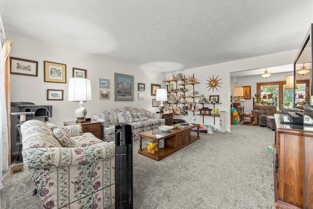 1356 Briarcliff Dr, Rantoul, IL 61866 - living area with carpet flooring and a textured ceiling