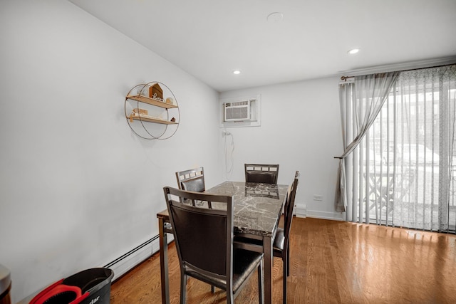 9819 Nottingham Ave Unit 106, Chicago Ridge, IL 60415 - dining space with wood finished floors, a baseboard heating unit, recessed lighting, and an AC wall unit