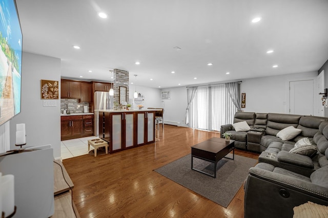 9819 Nottingham Ave Unit 106, Chicago Ridge, IL 60415 - living area featuring recessed lighting, light wood-style flooring, an AC wall unit, and baseboard heating
