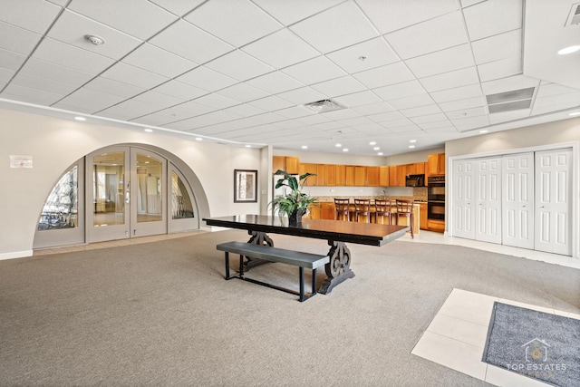 1 Renaissance Pl Unit 1121, Palatine, IL 60067 - living room with light colored carpet, a paneled ceiling, and recessed lighting
