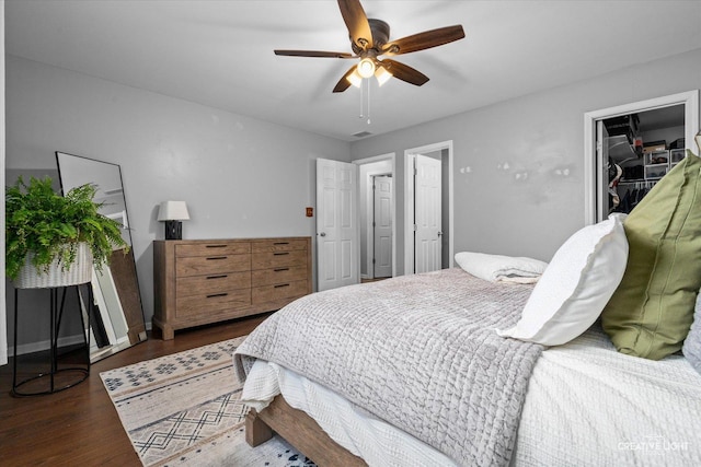 1005 Georgian Pl Unit 1005, Bartlett, IL 60103 - bedroom with wood finished floors, a ceiling fan, and a spacious closet