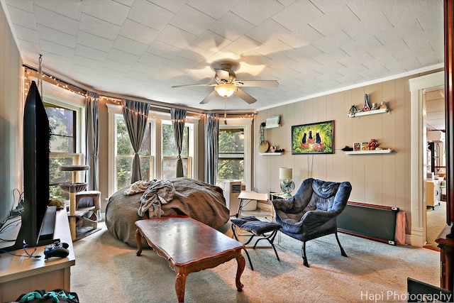 146 Westerfield Pl, Grayslake, IL 60030 - living room with healthy amount of natural light, carpet flooring, ceiling fan, and crown molding
