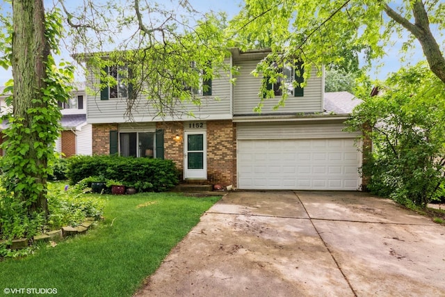 1152 Greensfield Dr, Naperville, IL 60563 - view of front of property featuring driveway, brick siding, a front lawn, and an attached garage
