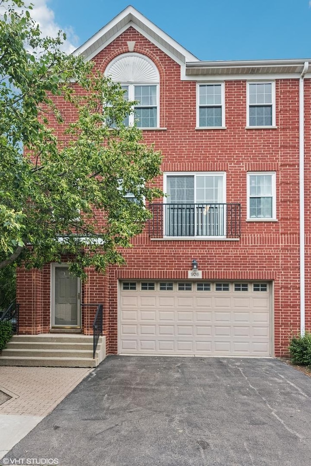 926 Bromley Pl, Northbrook, IL 60062 - view of front of property with asphalt driveway, a garage, and brick siding