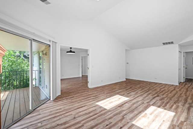 1401 Clove Ct Unit D, Mount Prospect, IL 60056 - unfurnished living room with wood finished floors and lofted ceiling