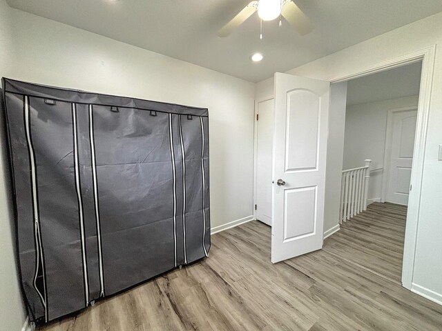 8664 Gregory Ln Unit E, Des Plaines, IL 60016 - unfurnished bedroom with light wood-type flooring, recessed lighting, and a ceiling fan