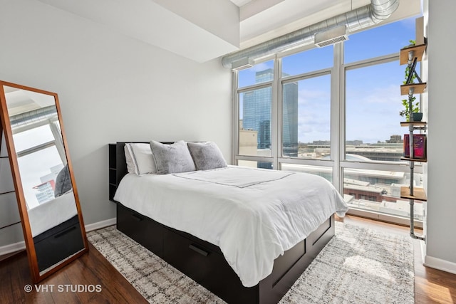 212 E Cullerton St Unit Ph06, Chicago, IL 60616 - bedroom with wood finished floors and baseboards