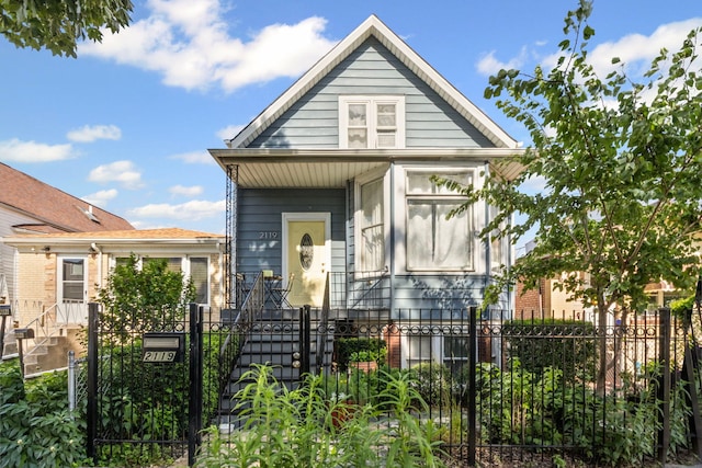 2119 N Karlov Ave, Chicago, IL 60639 - view of front facade with a fenced front yard