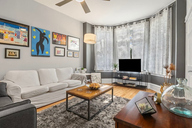 2119 N Karlov Ave, Chicago, IL 60639 - living room featuring wood finished floors and a ceiling fan