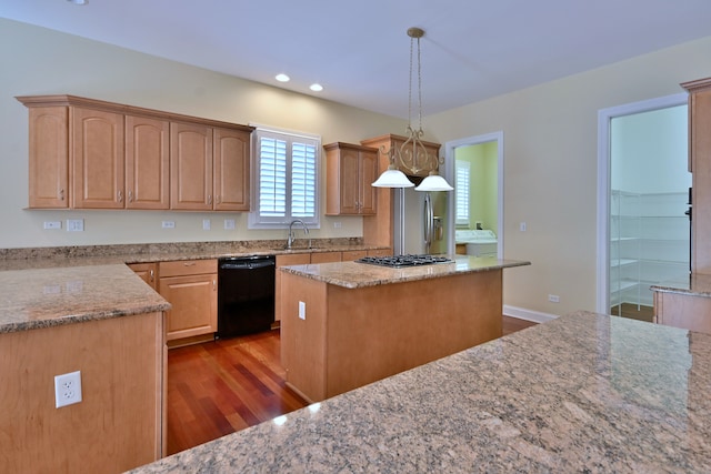 121 Rose Dr, Bloomingdale, IL 60108 - kitchen with stainless steel appliances, dark wood finished floors, recessed lighting, light stone countertops, and a center island