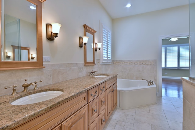 121 Rose Dr, Bloomingdale, IL 60108 - full bath with a bath, double vanity, and tile patterned floors