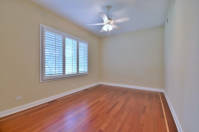 121 Rose Dr, Bloomingdale, IL 60108 - unfurnished room with wood finished floors and ceiling fan