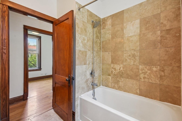 2638 W Rice St Unit 2S, Chicago, IL 60622 - bathroom featuring shower / bathtub combination and baseboards