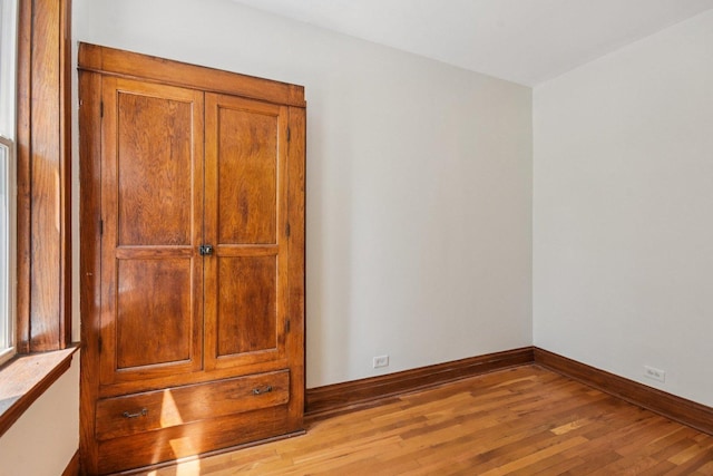 2638 W Rice St Unit 2S, Chicago, IL 60622 - unfurnished bedroom with light wood finished floors and baseboards