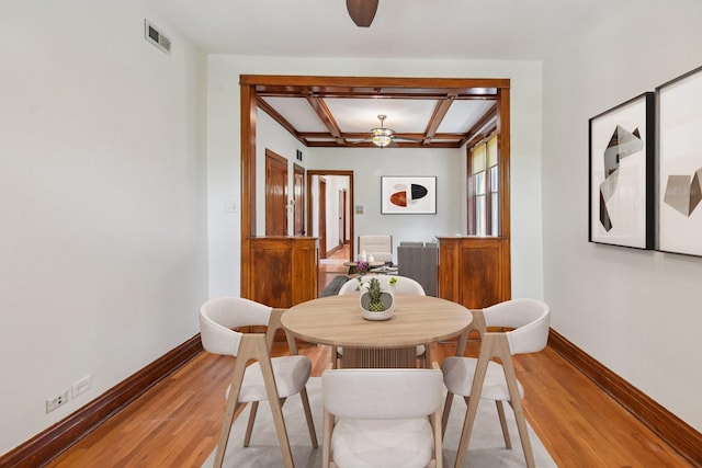 2638 W Rice St Unit 2S, Chicago, IL 60622 - dining room with a ceiling fan, light wood finished floors, and coffered ceiling