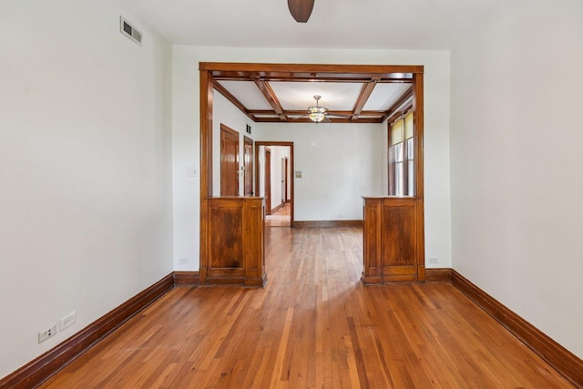 2638 W Rice St Unit 2S, Chicago, IL 60622 - empty room with a ceiling fan, hardwood / wood-style flooring, coffered ceiling, and beamed ceiling