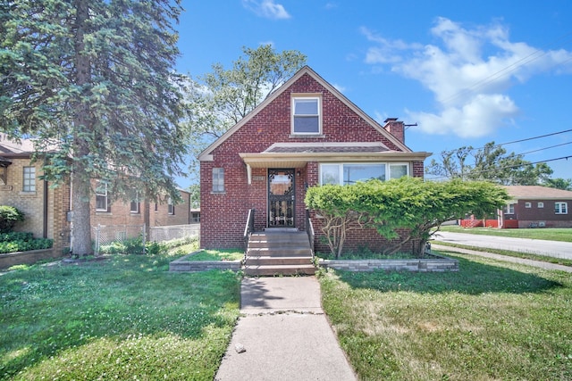 14528 Grant St, Dolton, IL 60419 - view of front facade featuring a chimney and brick siding