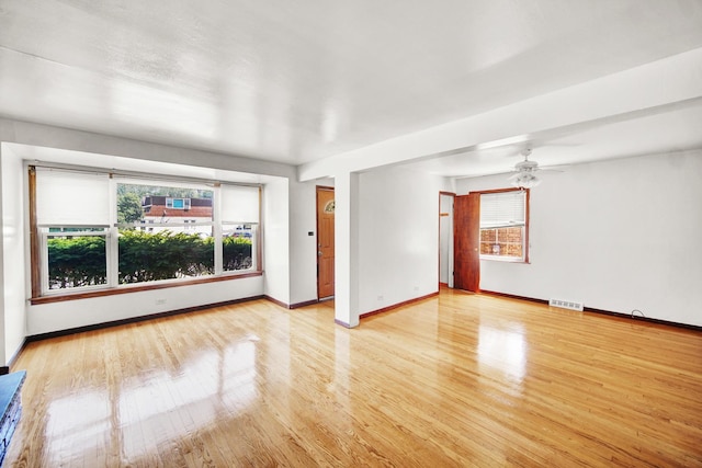 14528 Grant St, Dolton, IL 60419 - spare room with light wood-style floors and a ceiling fan