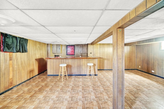 14528 Grant St, Dolton, IL 60419 - indoor bar featuring a paneled ceiling, wood walls, and brick patterned floors