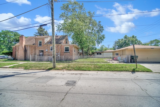 14528 Grant St, Dolton, IL 60419 - view of front of property featuring brick siding and a chimney