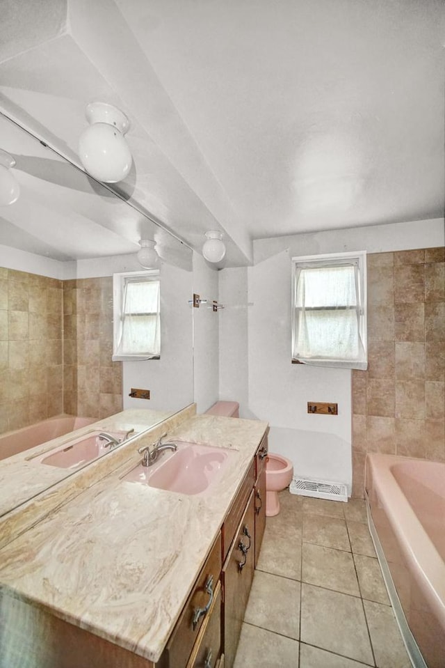 14528 Grant St, Dolton, IL 60419 - full bathroom featuring a tub to relax in, vanity, and tile patterned floors