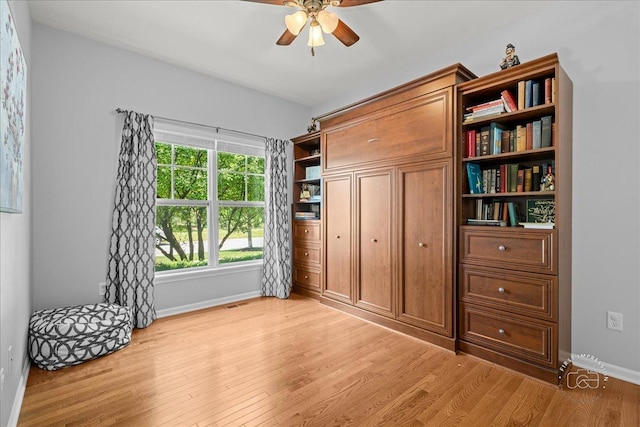 0N585 Charlotte Dr, Geneva, IL 60134 - bedroom with light wood-style flooring and a ceiling fan