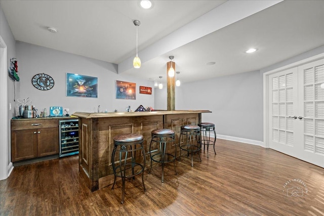 0N585 Charlotte Dr, Geneva, IL 60134 - indoor wet bar featuring wine cooler, dark wood-style flooring, hanging light fixtures, and recessed lighting