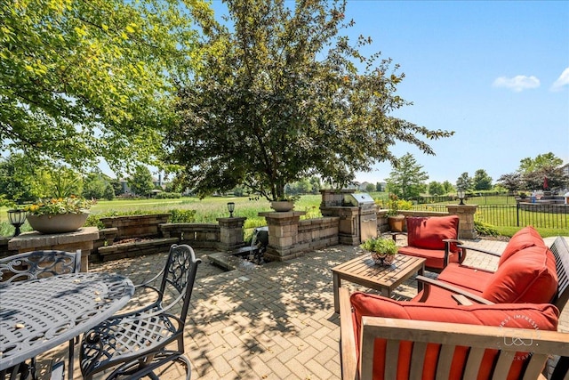 0N585 Charlotte Dr, Geneva, IL 60134 - view of patio featuring area for grilling, an outdoor hangout area, and outdoor dining space